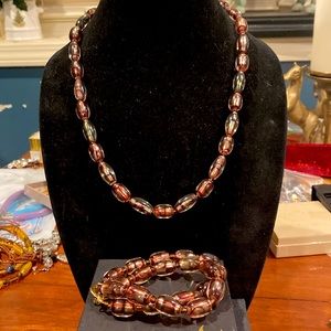 Necklace and Bracelet Set in Gold Tones. Glows Green.